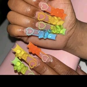 Colorful 3D Nail Art with Heart Accents